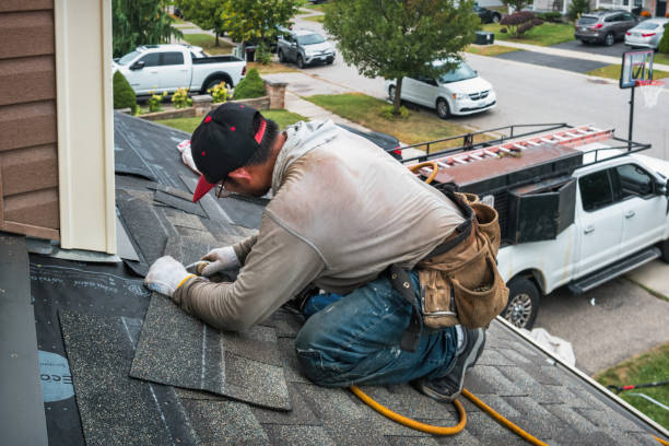 Professional Emergency Roof Repair technician working in Stoneham, MA